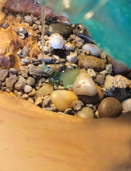 pouring epoxy on the resin table