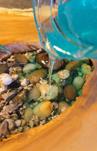 pour the resin onto the table